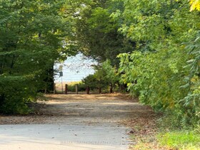 15 Tiny Beaches Road N, Simcoe, ON , MLS #S12236229 , Image - 1